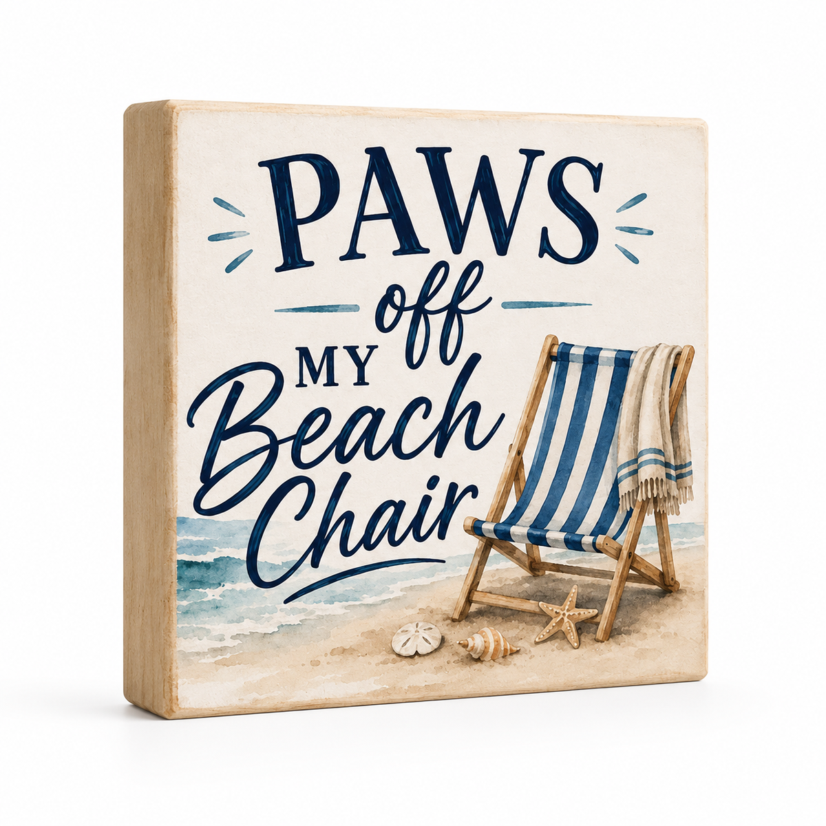 A square decorative wooden sign with a light natural wood border and a beach-themed printed design. The sign reads “PAWS off my Beach Chair” in navy lettering, with an illustrated blue-and-white striped beach chair, sand, ocean, and small seashells on a white background.