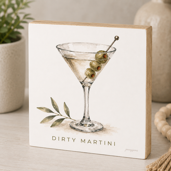 Framed artwork of a Dirty Martini with olives on a white background