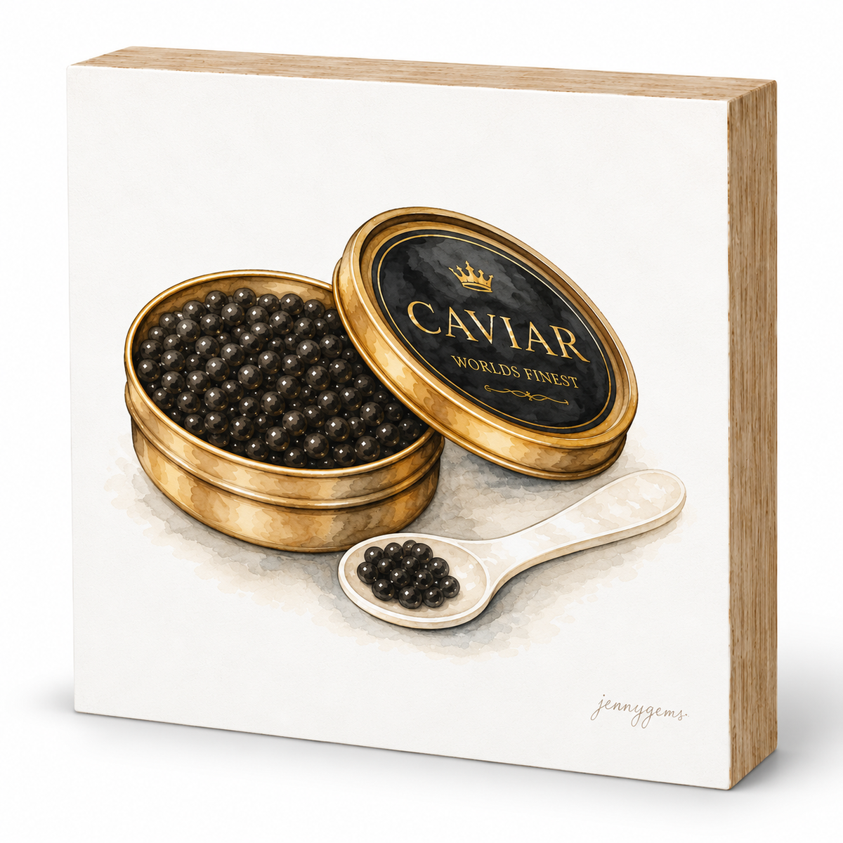 A square decorative box or plaque featuring a painted illustration of an open round tin of caviar with the lid leaning against it and a spoonful of black caviar beads in front. The lid has visible text reading 'CAVIAR' and 'WORLD'S FINEST' with a small crown.