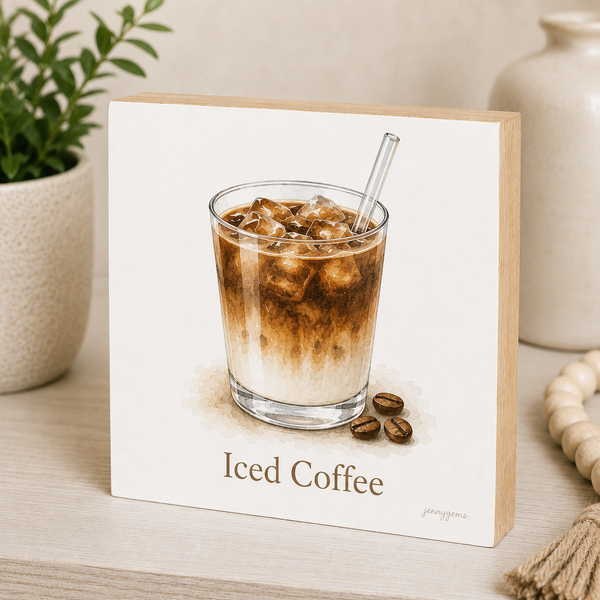 Decorative sign with an illustration of iced coffee and coffee beans on a wooden stand.