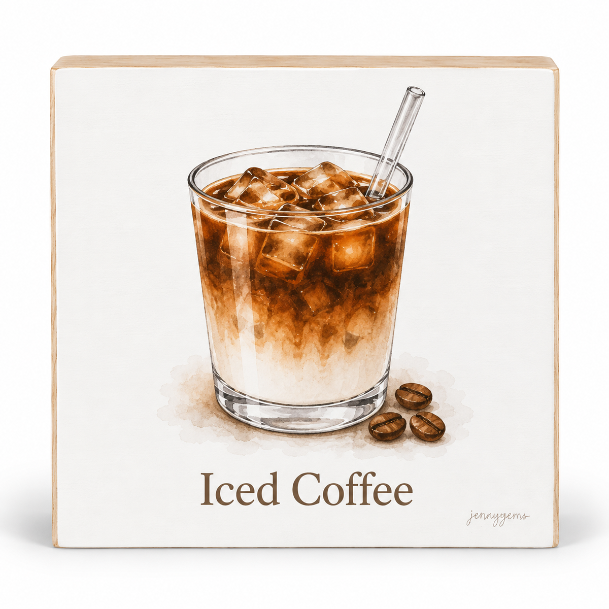 A square decorative sign or plaque showing a painted illustration of an iced coffee drink in a clear glass with a metal straw, plus three coffee beans and the text 'Iced Coffee' at the bottom. The sign has a light wood border and is photographed against a plain white background.