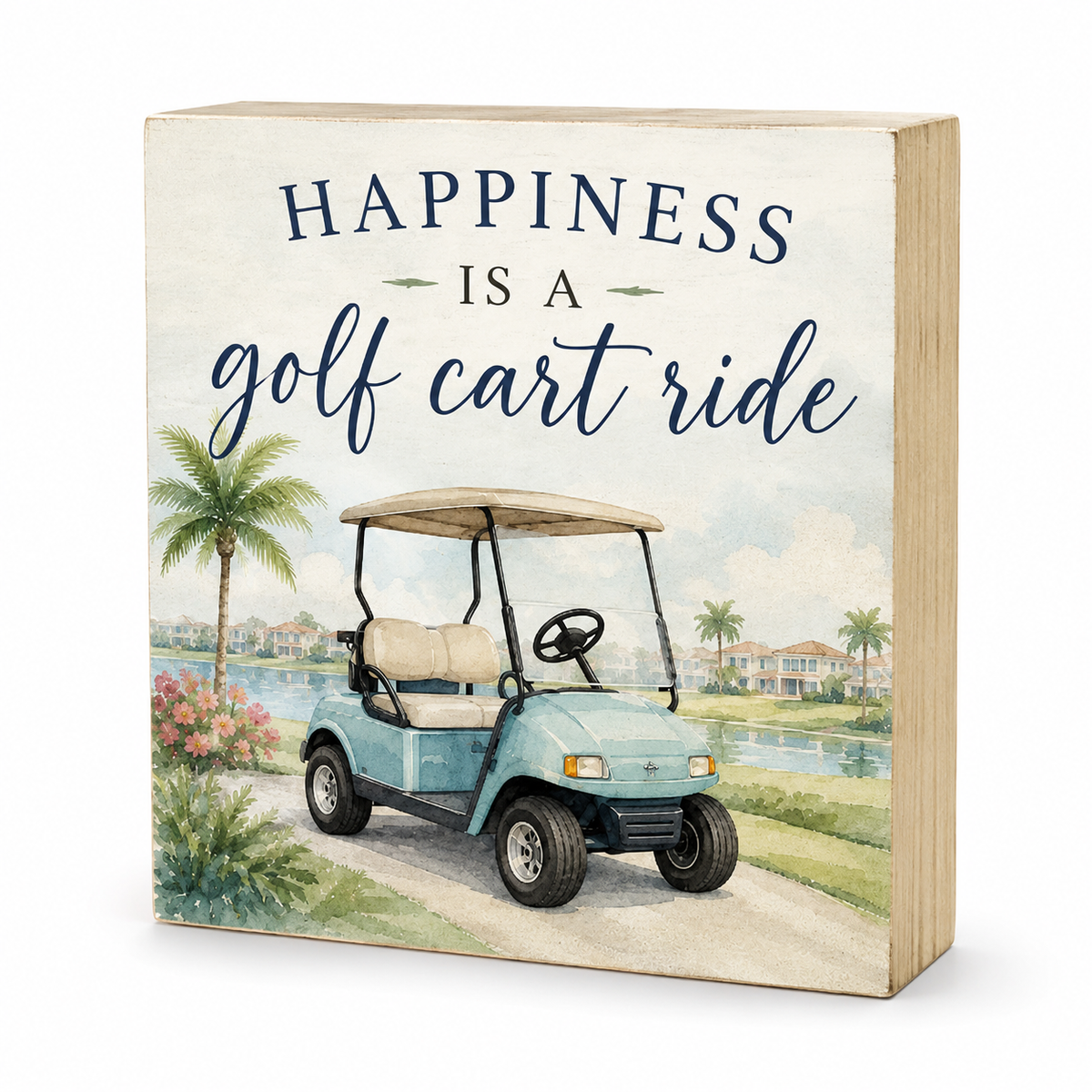 A rectangular wooden sign with a light wood edge, featuring a watercolor-style illustration of a golf cart on a golf course with palm trees and the text 'HAPPINESS IS A golf cart ride'.