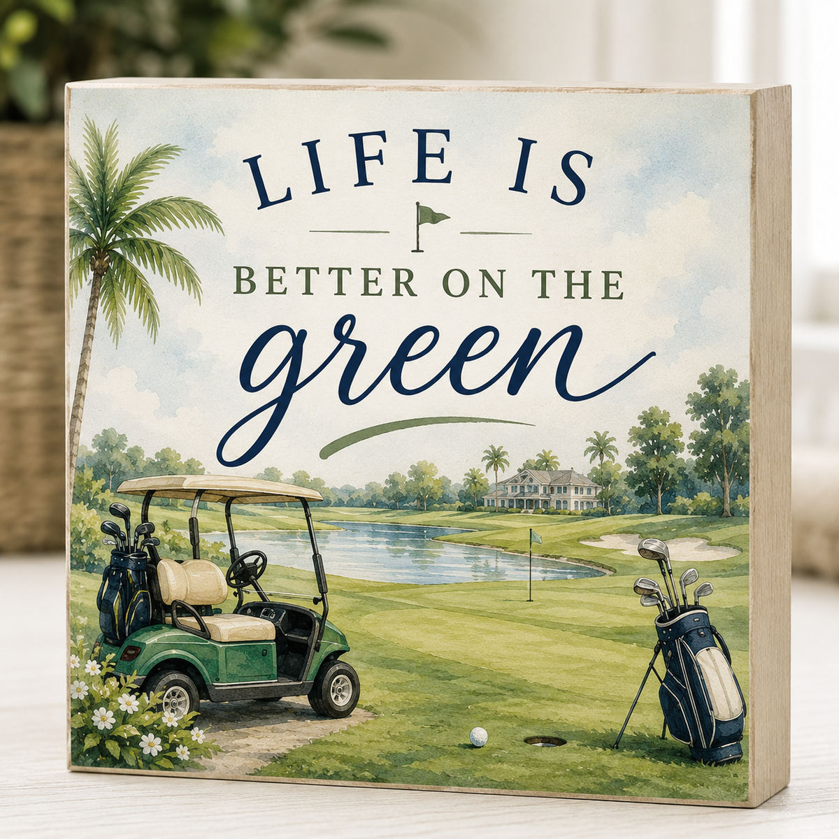 Decorative sign with golf cart and 'Life is Better on the Green' text