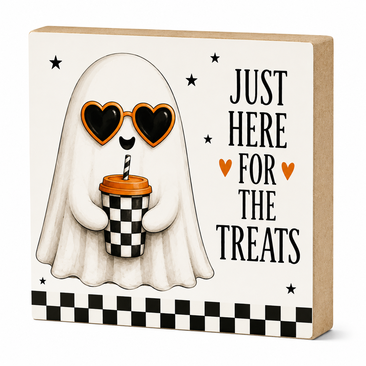 A square decorative sign with a cartoon ghost wearing heart-shaped sunglasses and holding a checkered cup, next to the text 'JUST HERE FOR THE TREATS' on a white face with a tan wood side, shown on a light gray background.