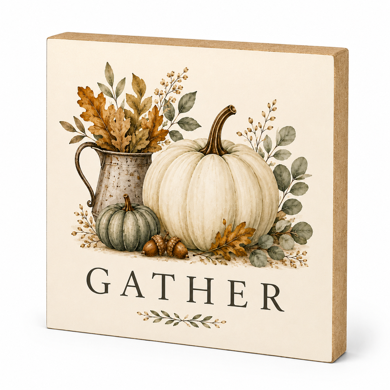 Square decorative wall sign with a fall harvest illustration featuring a large cream pumpkin, a small green pumpkin, acorns, leaves, and a rustic metal pitcher. The word “GATHER” appears in dark serif letters near the bottom, with a small leaf motif underneath.