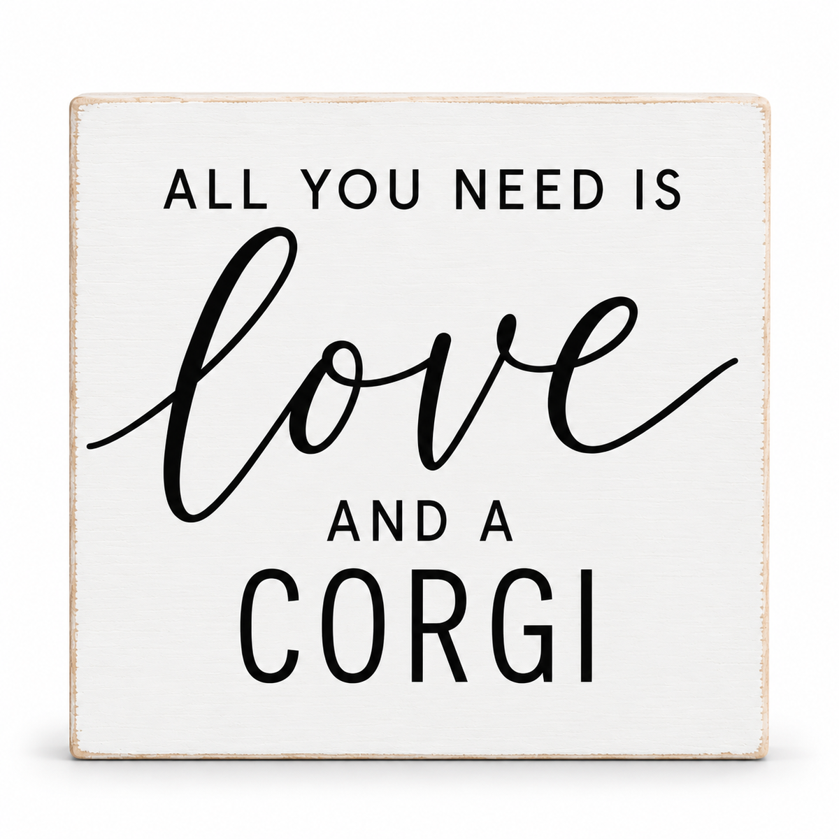 A square white decorative sign with a distressed natural wood edge, featuring the text 'ALL YOU NEED IS love AND A CORGI' in black lettering on a white background.