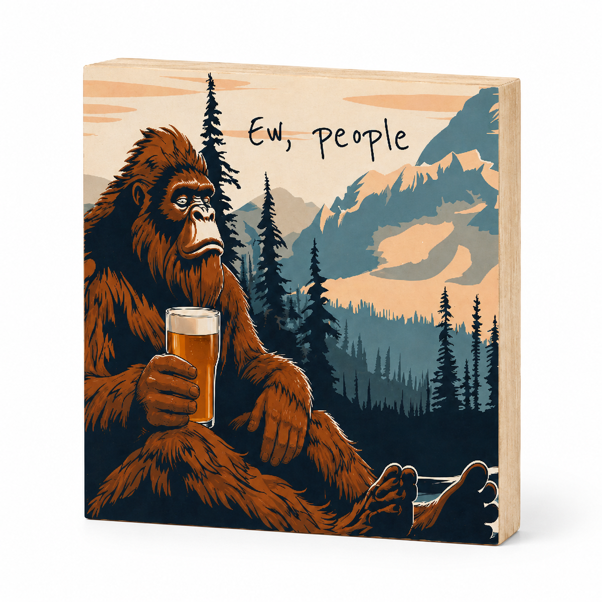 A square wooden block sign featuring a stylized illustration of a Bigfoot-like figure holding a pint of beer, with mountains, pine trees, and the text 'Ew, people' on the front. The natural wood side of the block is visible, and the sign is photographed on a clean white background.