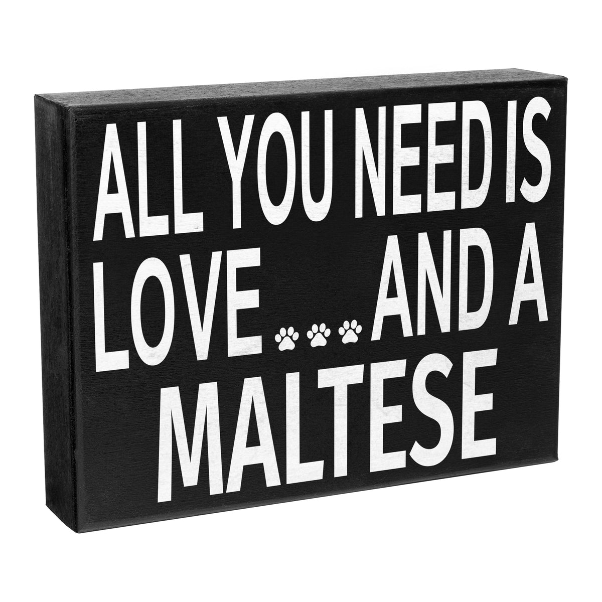 A wooden sign with the text 'All You Need is Love and a Maltese' and a paw print symbol.
