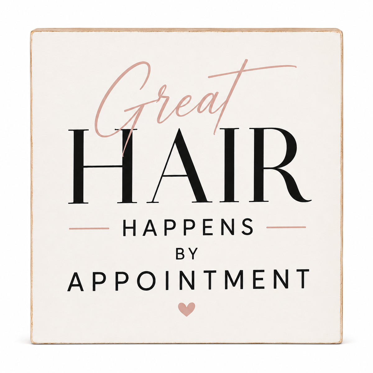 A square decorative sign with a distressed cream background and a thin natural wood border. The text reads 'Great HAIR HAPPENS BY APPOINTMENT' in black and dusty rose lettering, with a small rose-pink heart at the bottom.
