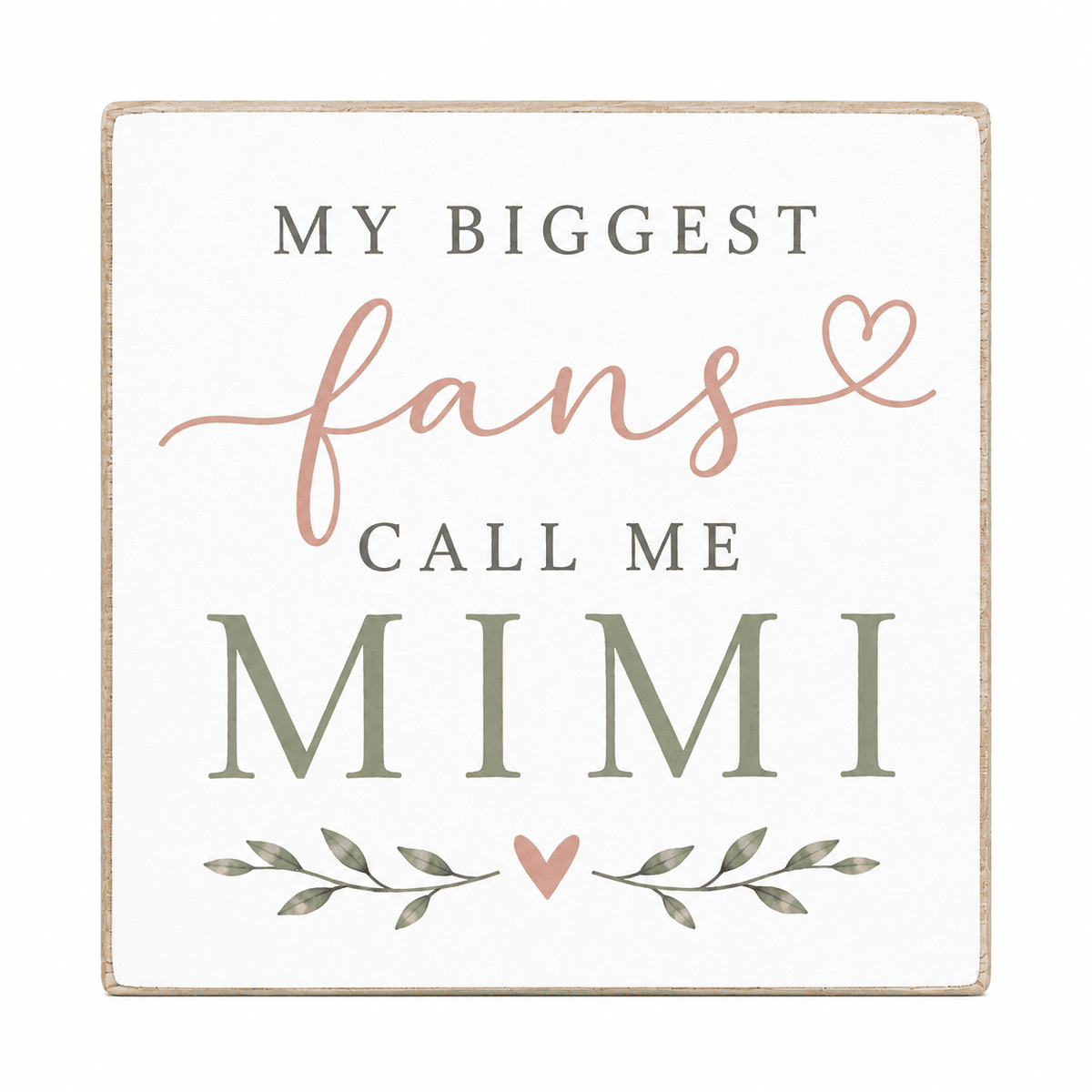 A square decorative sign with a distressed cream background and a light wood border. The text reads 'MY BIGGEST fans CALL ME MIMI' in gray and dusty pink lettering, with small leaf and heart illustrations below.