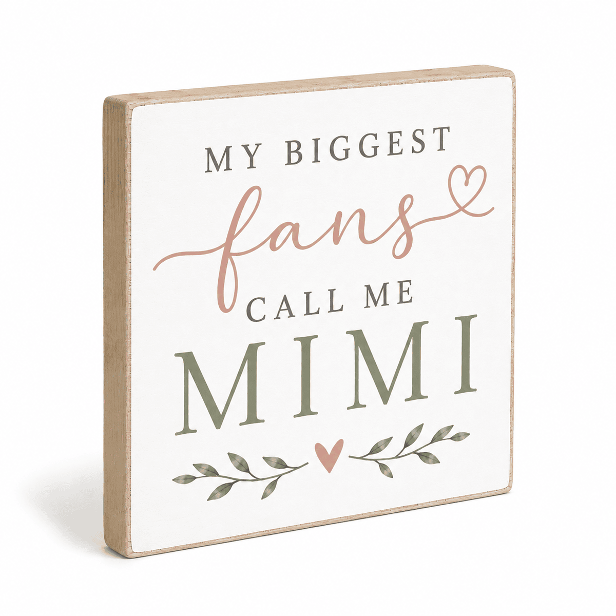A square decorative wooden sign with a white face and natural wood edges, printed with the phrase 'MY BIGGEST fans CALL ME MIMI' in dark gray and dusty pink lettering, with small leaf and heart accents, on a white background.