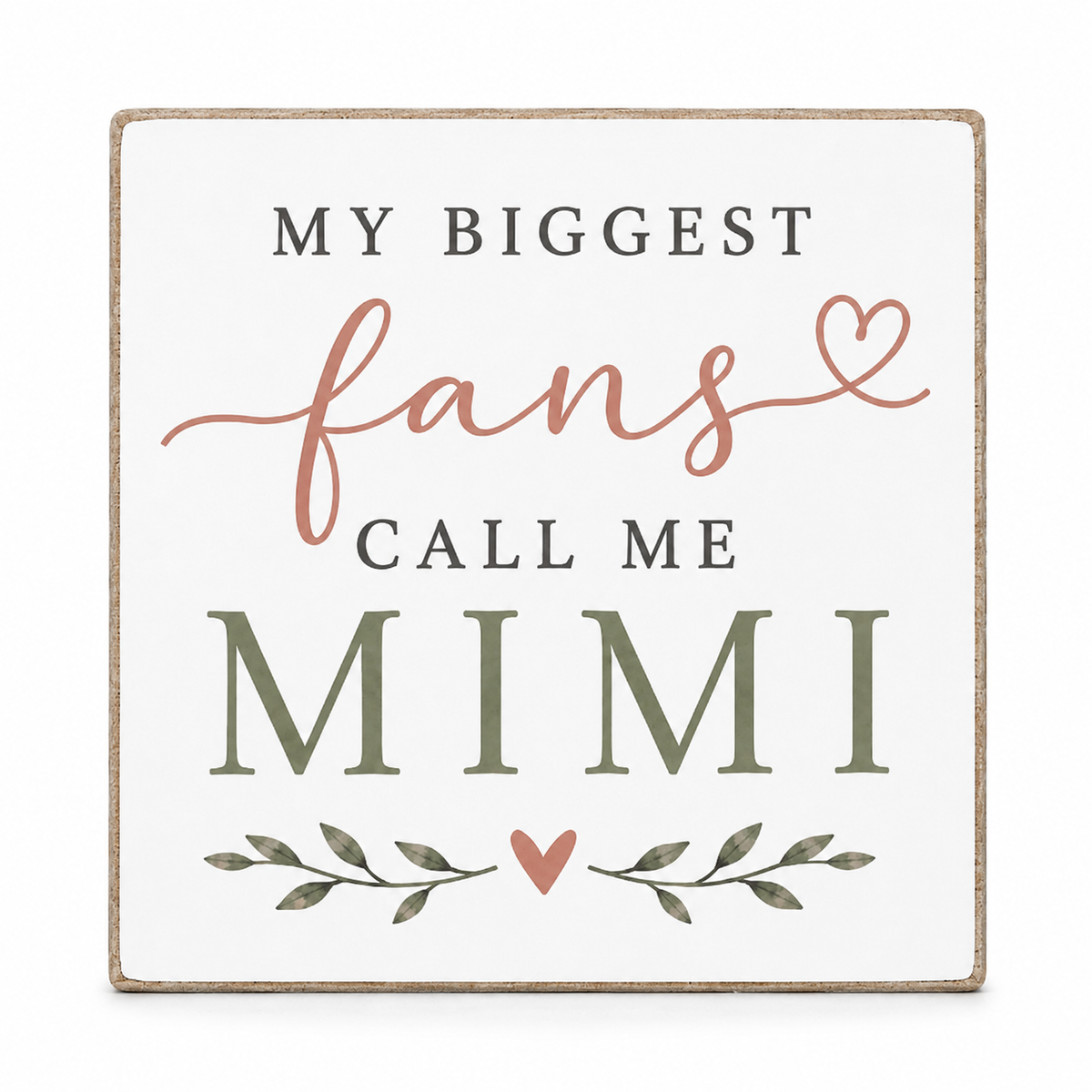 A square decorative sign with a white face and a natural wood border, featuring the text 'MY BIGGEST fans CALL ME MIMI' in dark gray and dusty rose lettering, with small leafy branches and hearts at the bottom, shown on a white background.