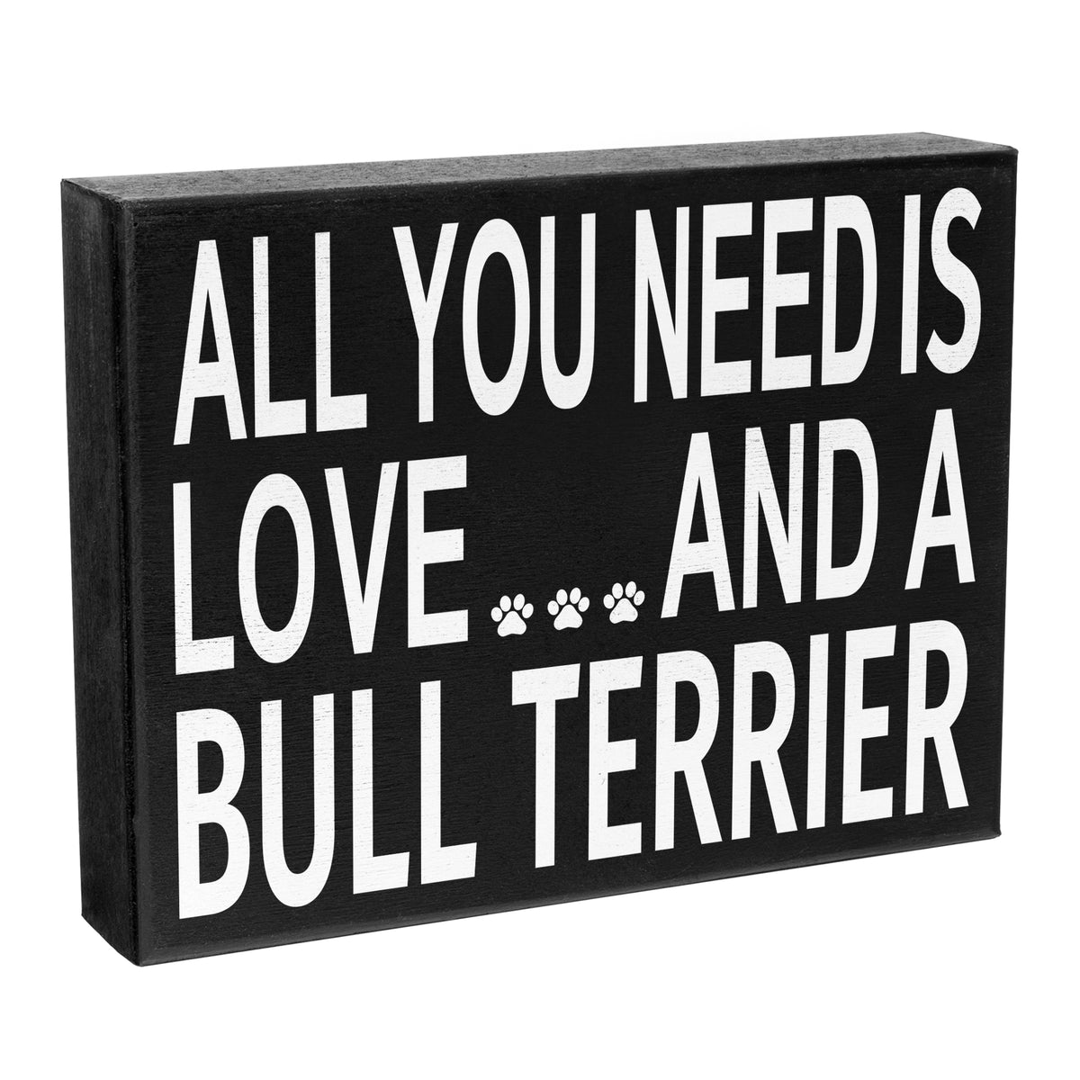 A black wooden sign with the text 'All you need is LOVE and a BULL TERRIER' in white capital letters, with a paw print symbol after the word 'LOVE'.