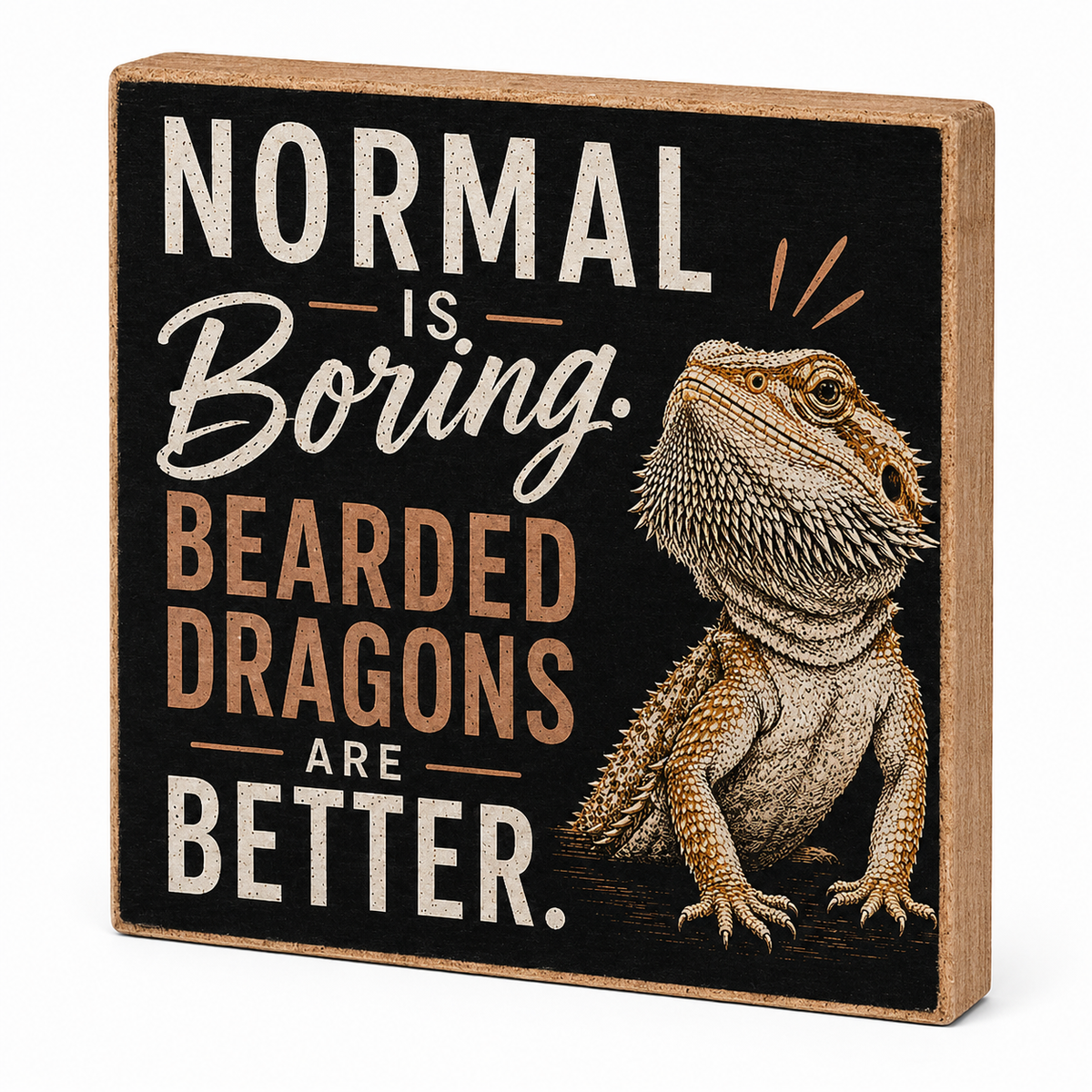 A square decorative sign with a black face and natural wood edges, featuring the text 'NORMAL IS Boring. BEARED DRAGONS ARE BETTER.