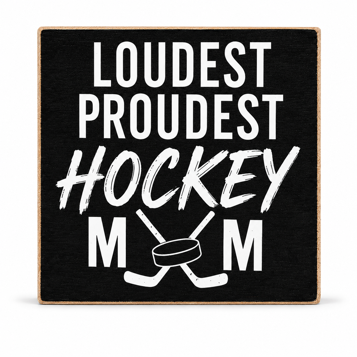 A square black decorative sign with a light wood border, featuring the phrase 'LOUDEST PROUDEST HOCKEY MOM' in white lettering with crossed hockey sticks and a hockey puck graphic.