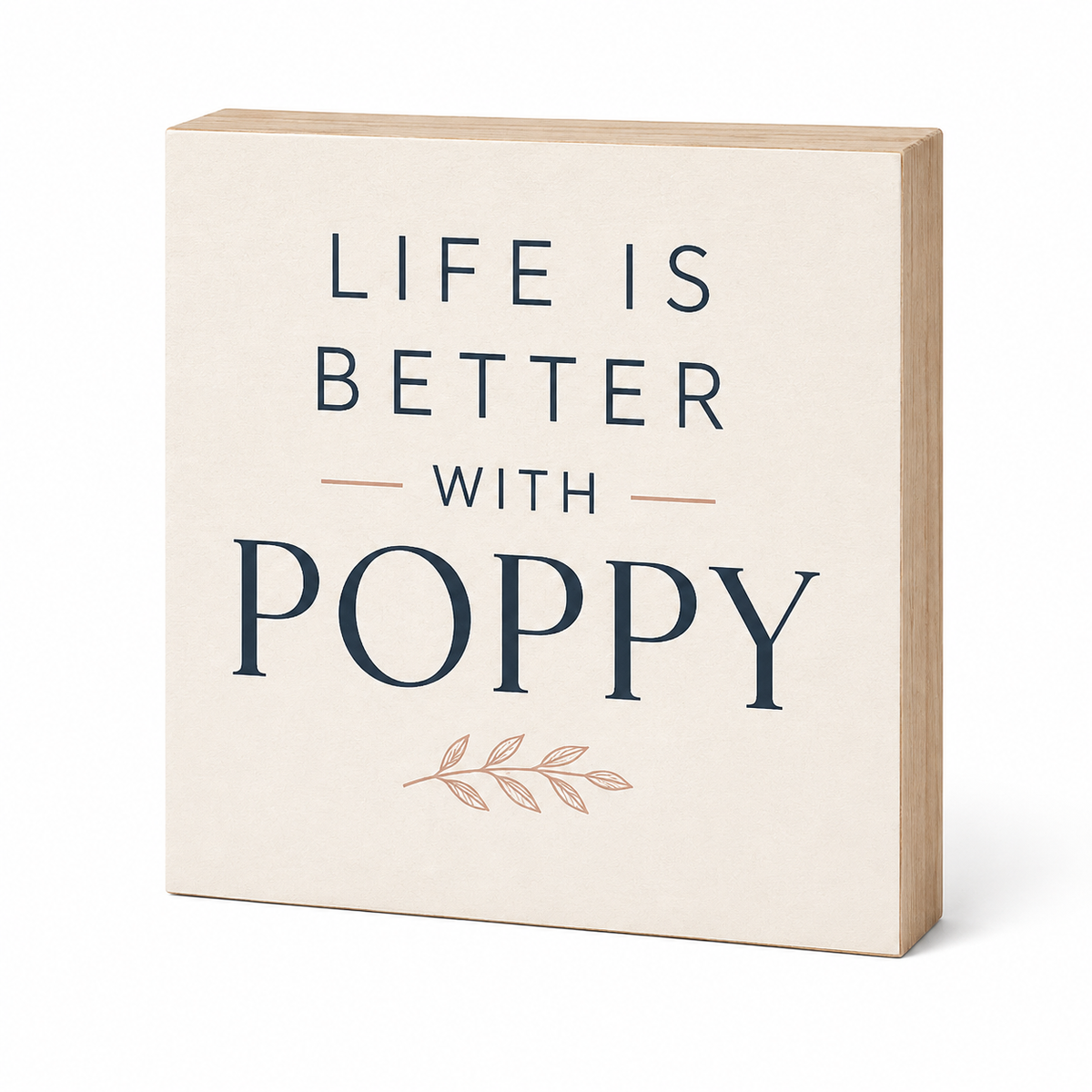 A square decorative wooden sign with a light beige front and natural wood edges, printed with the phrase 'LIFE IS BETTER WITH POPPY' in dark navy lettering and a small peach leaf illustration, shown on a white background.
