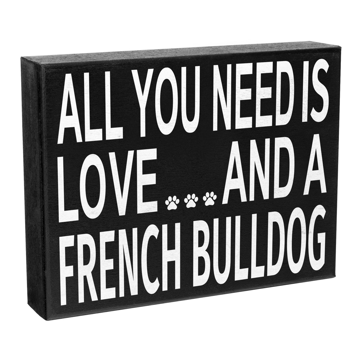 A black wooden sign with the text 'All You Need is Love AND A LOVE FOR A FRENCH BULLDOG' in white letters, featuring a paw print symbol after the text.