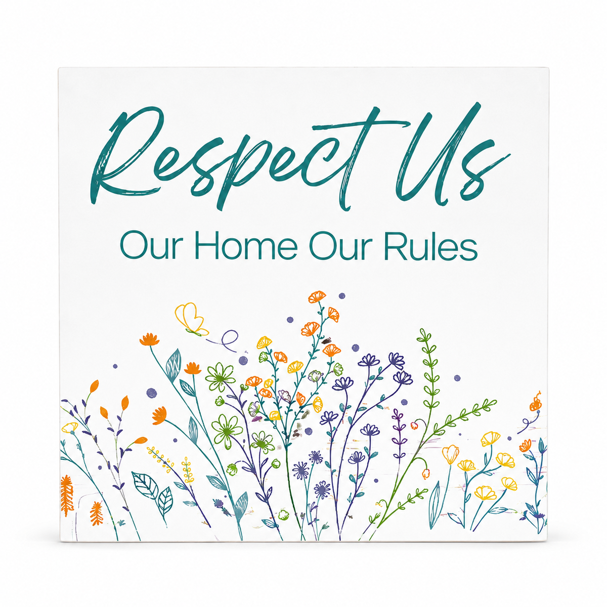 Square white wall sign with the phrase 'Respect Us Our Home Our Rules' in teal lettering, decorated with colorful hand-drawn wildflowers along the bottom, shown against a light gray background.