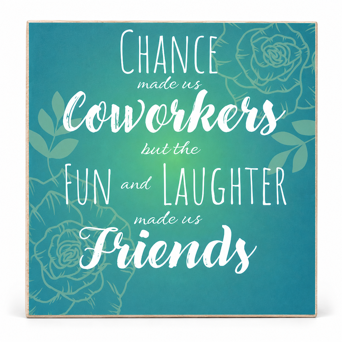 Square decorative wall sign with a teal-to-turquoise gradient background, white decorative text reading 'Chance made us coworkers but the fun and laughter made us Friends,' and faint rose line illustrations. The sign has a light natural wood border and is shown against a plain white background.