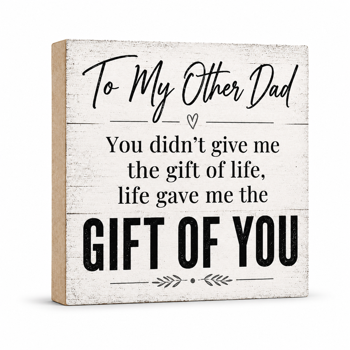 A square rustic wooden sign with a distressed white painted face and natural wood edges. The sign features black text that reads 'To My Other Dad You didn't give me the gift of life, life gave me the GIFT OF YOU' with decorative script and arrow details, shown on a clean white background.