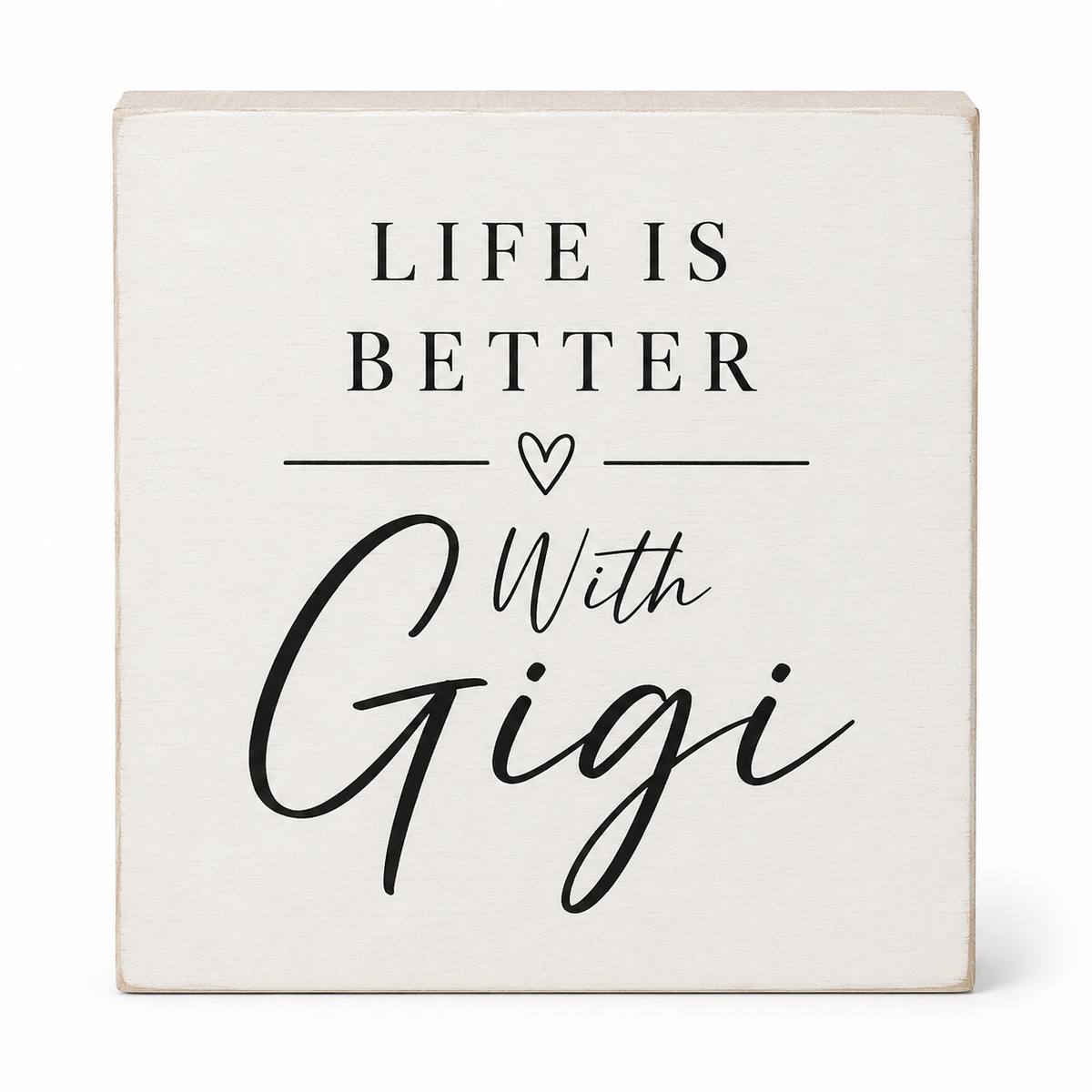 A square decorative sign with a distressed off-white wood finish and black text that reads 'LIFE IS BETTER With Gigi' and a small heart, shown on a clean white background.