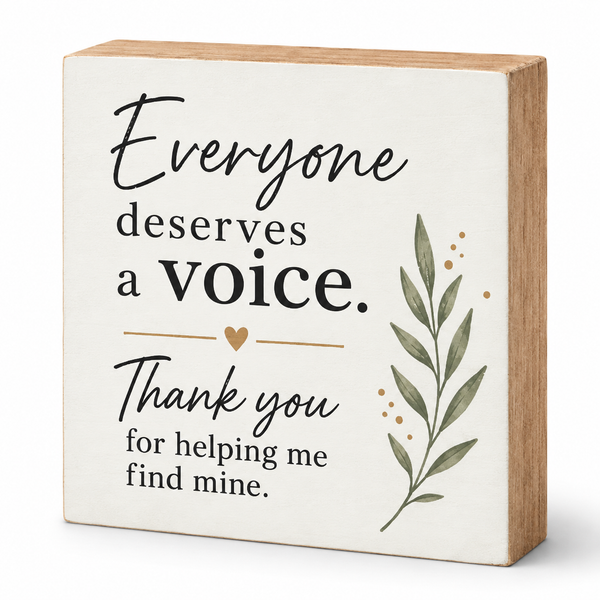 A square decorative wooden sign with a cream face and natural wood sides. The sign features the text 'Everyone deserves a voice.