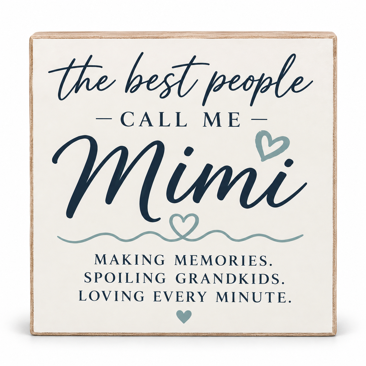 A square decorative wooden sign with a light natural wood border and an off-white face. The sign features navy blue and light blue-gray text reading 'the best people CALL ME Mimi MAKING MEMORIES.