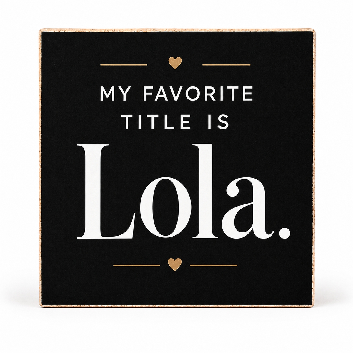 Square decorative wall sign with a black face and natural wood border, featuring the text 'MY FAVORITE TITLE IS Lola.' in white with small gold heart and line accents, shown on a white background.