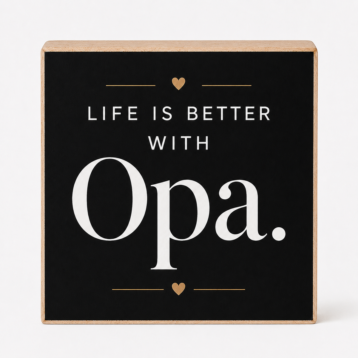 Square decorative wall sign with a black face and natural wood edges, reading “LIFE IS BETTER WITH Opa.” in white text with small gold heart and line accents, shown on a light gray background.