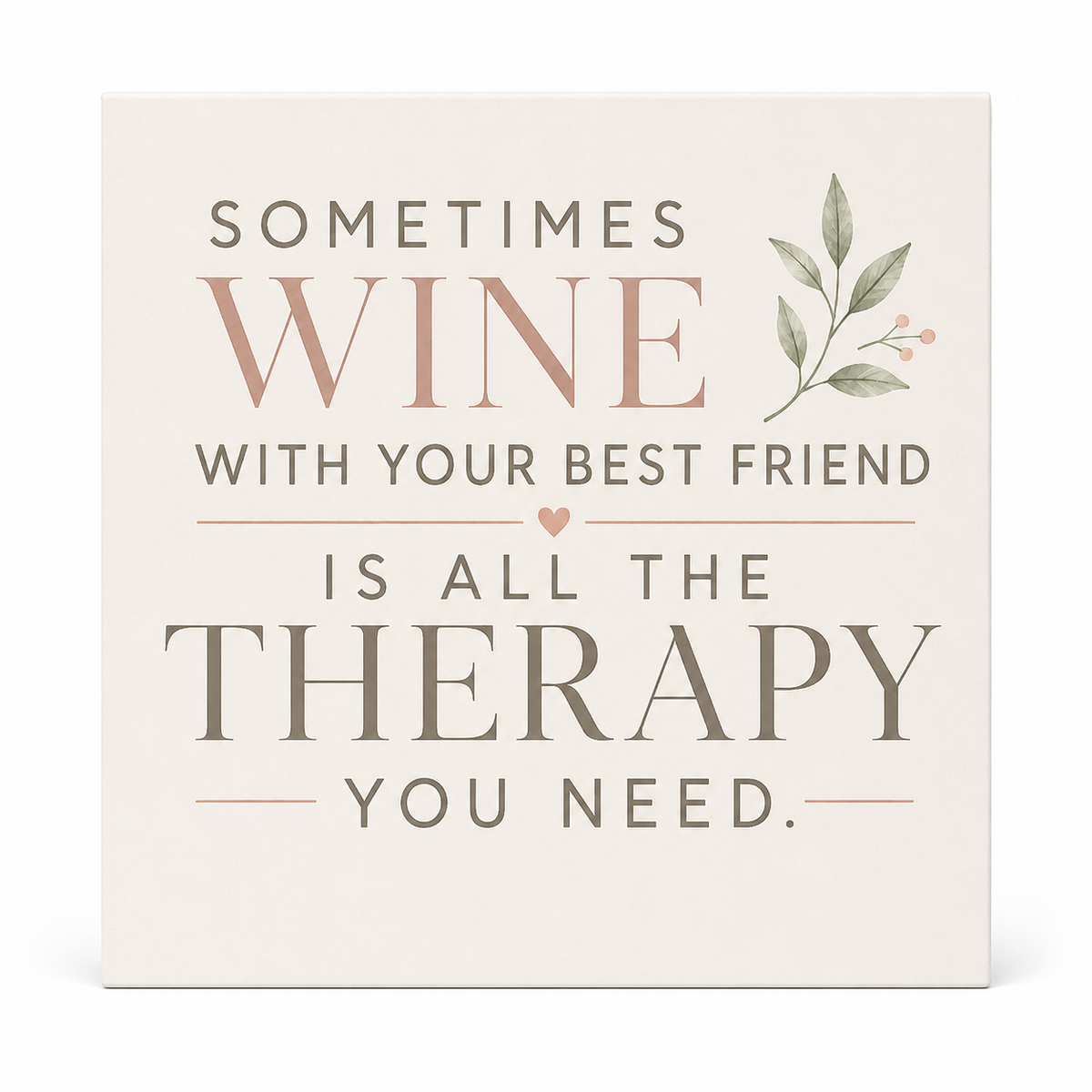 A square ceramic tile coaster with a humorous quote that reads 'SOMETIMES WINE WITH YOUR BEST FRIEND IS ALL THE THERAPY YOU NEED.' in muted brown and dusty rose lettering, decorated with a small watercolor olive branch on the top right.