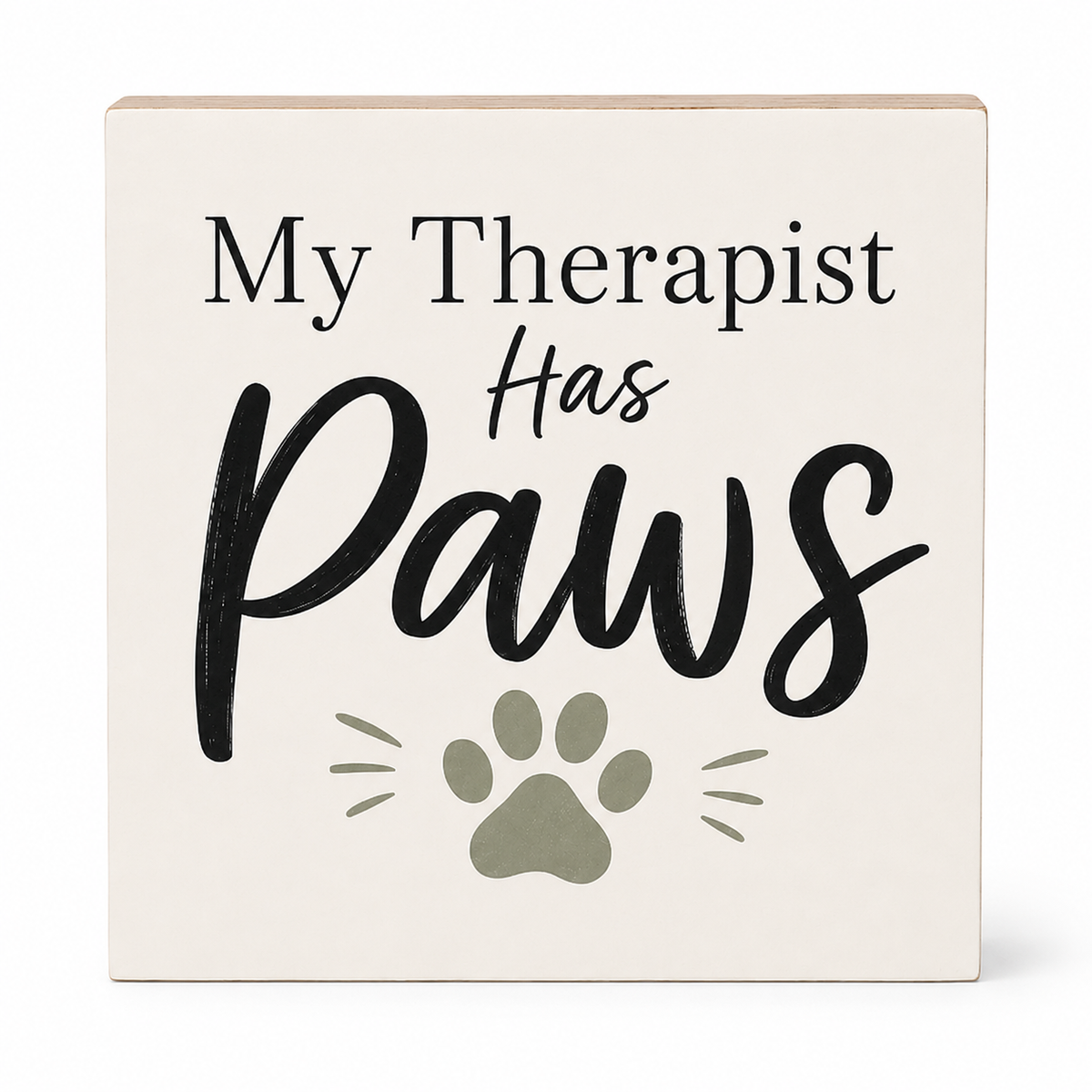 A square decorative sign with the phrase 'My Therapist Has Paws' in black lettering, plus a muted olive paw print and whisker marks, shown on a clean white background.
