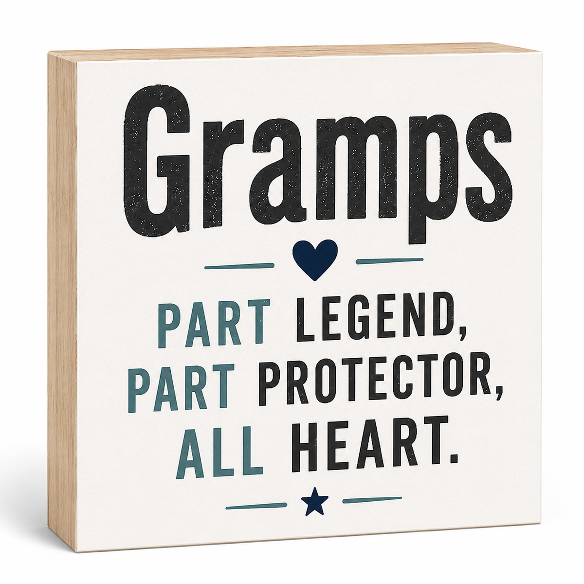 A square wooden sign with a cream face and natural wood sides, printed with the phrase “Gramps Part Legend, Part Protector, All Heart.” The text is styled in black and muted teal, with small heart and star accents, shown on a clean white background.