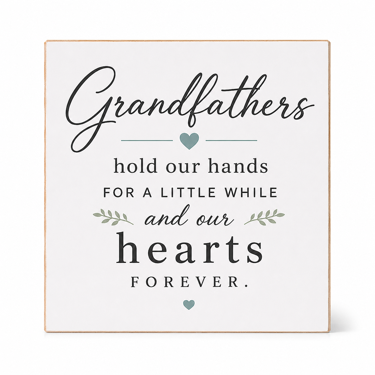 Square decorative wall sign with a light wood border and a white face, printed with the phrase “Grandfathers hold our hands for a little while and our hearts forever.” in dark gray lettering with small blue heart and leaf accents.