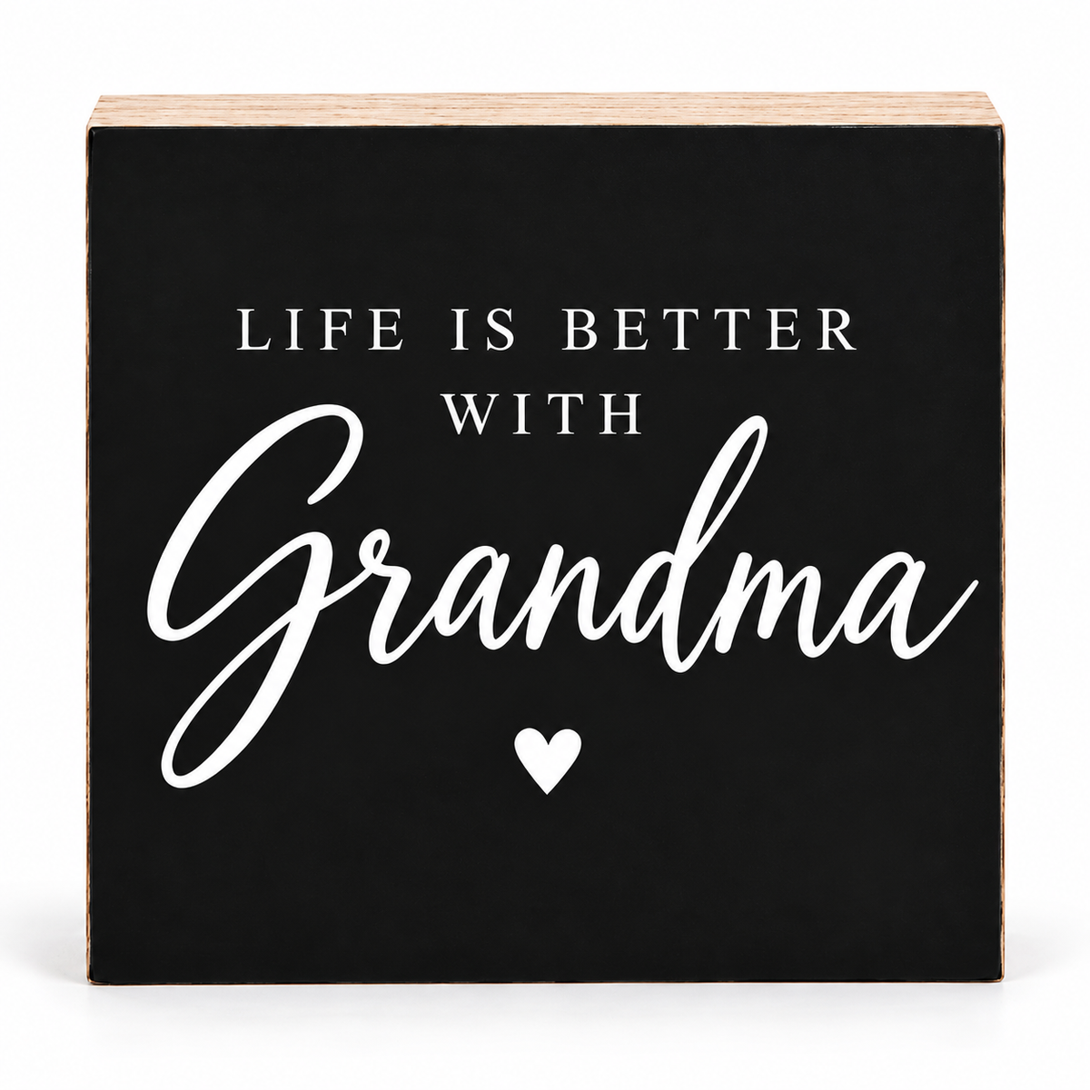 A square black decorative wooden sign with natural wood edges, featuring the phrase 'LIFE IS BETTER WITH Grandma' in white text and a small white heart below, shown on a clean white background.