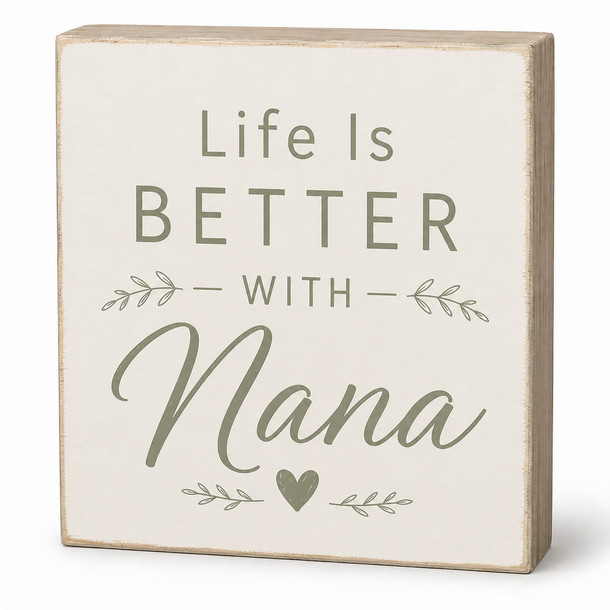 A square decorative wooden sign with a distressed cream face and natural wood edges. The sign features the text 'Life Is BETTER WITH Nana' in muted sage green lettering, accented with small leafy branches and a heart.