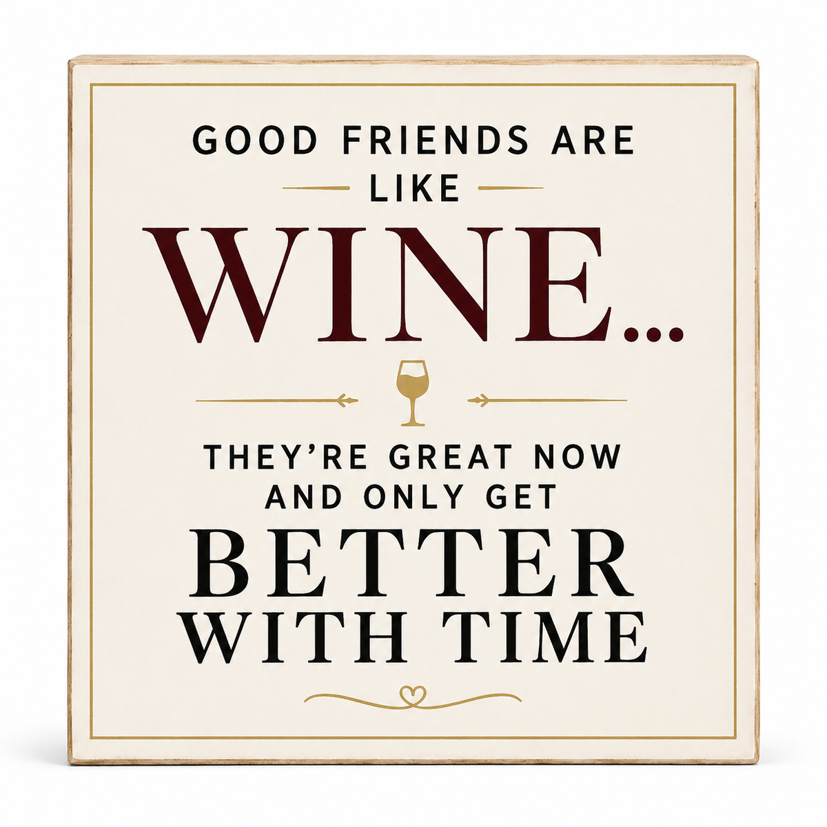 A square decorative sign with a distressed cream background and rustic wood-toned edges. The sign features the quote 'GOOD FRIENDS ARE LIKE WINE.