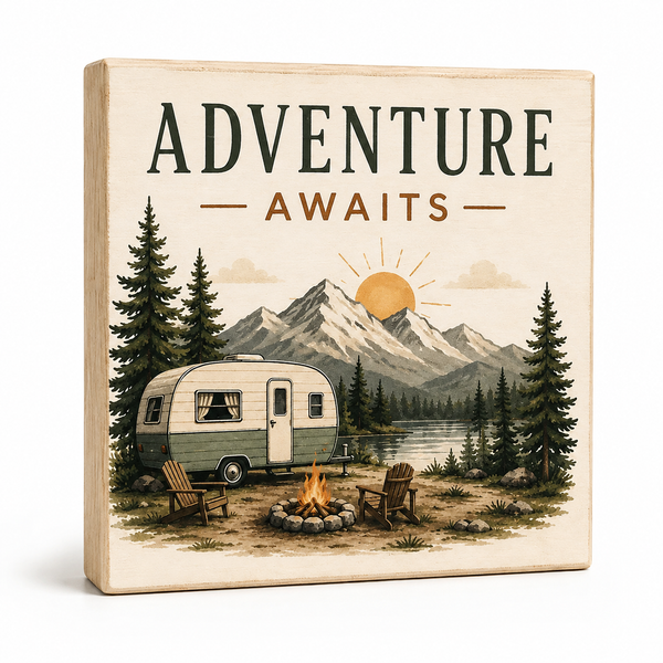 A square decorative wooden sign with a vintage-style camping illustration and the words “ADVENTURE AWAITS” printed on the front, shown against a clean white background.