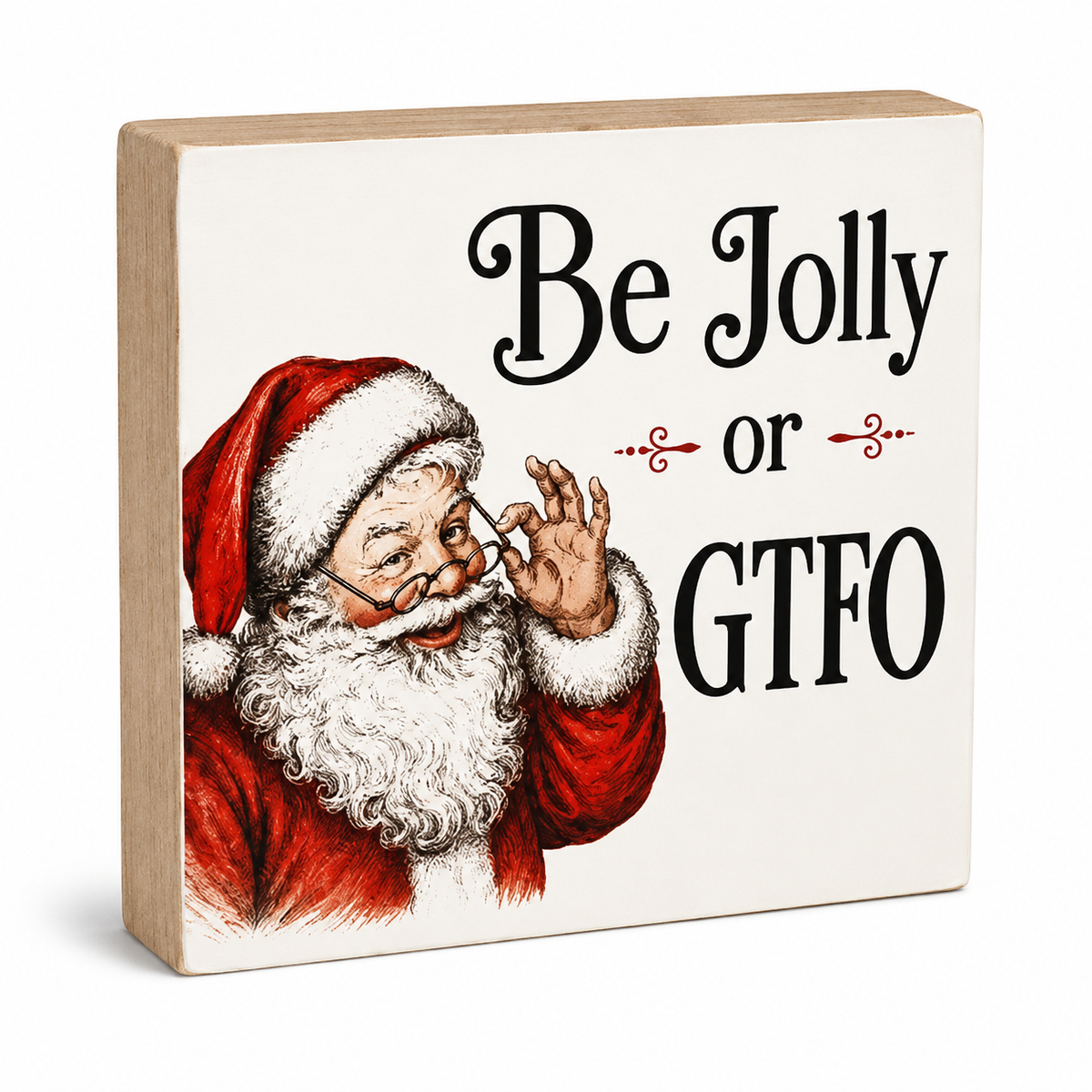 A square decorative wooden sign with a light natural wood border and an off-white face, featuring an illustration of Santa Claus on the left and the text 'Be Jolly or GTFO' in black and red lettering.