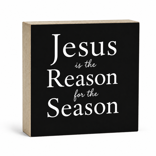 Black block sign with 'Jesus is the Reason for the Season' text on a white background