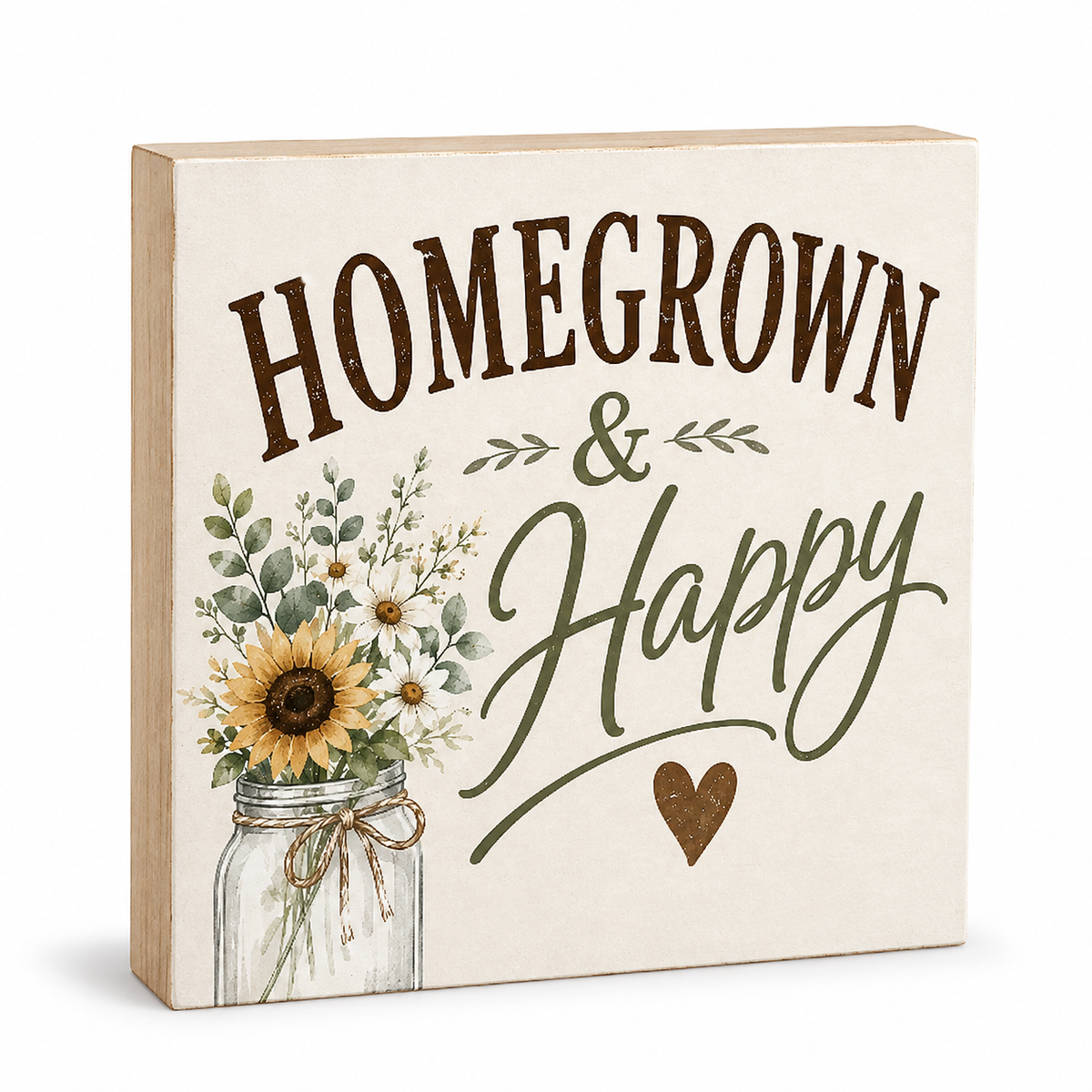 A square decorative wooden sign with a light natural wood edge and a cream front panel. The sign reads “HOMEGROWN & Happy” in dark brown and olive lettering, with a watercolor-style sunflower, eucalyptus leaves, and a small brown heart.