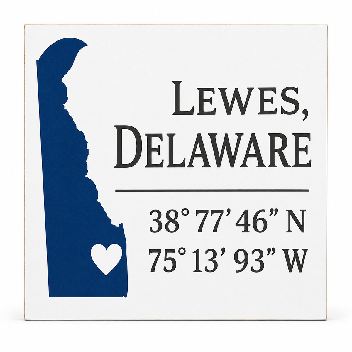Square decorative wall sign featuring the text 'LEWES, DELAWARE' with coordinates and a navy blue silhouette of Delaware with a white heart, shown on a white background.
