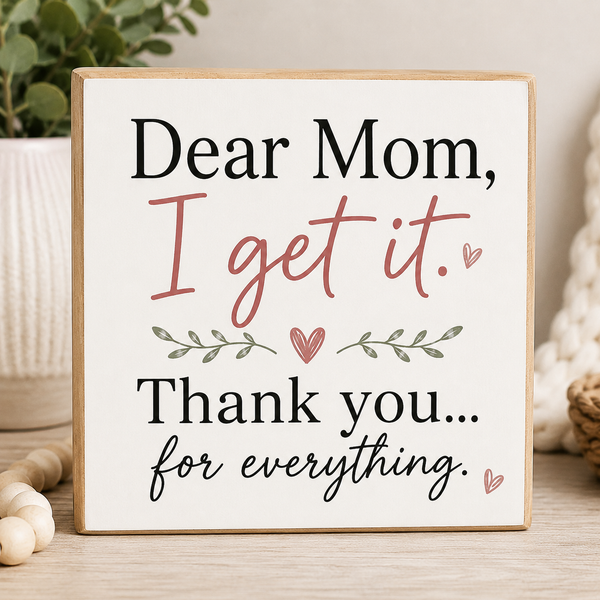 Decorative sign with a message to 'Dear Mom, I get it. Thank you... for everything.' on a neutral background.