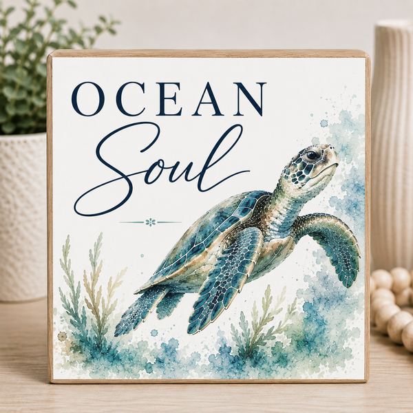 Framed artwork with a turtle illustration and 'Ocean Soul' text on a watercolor background.