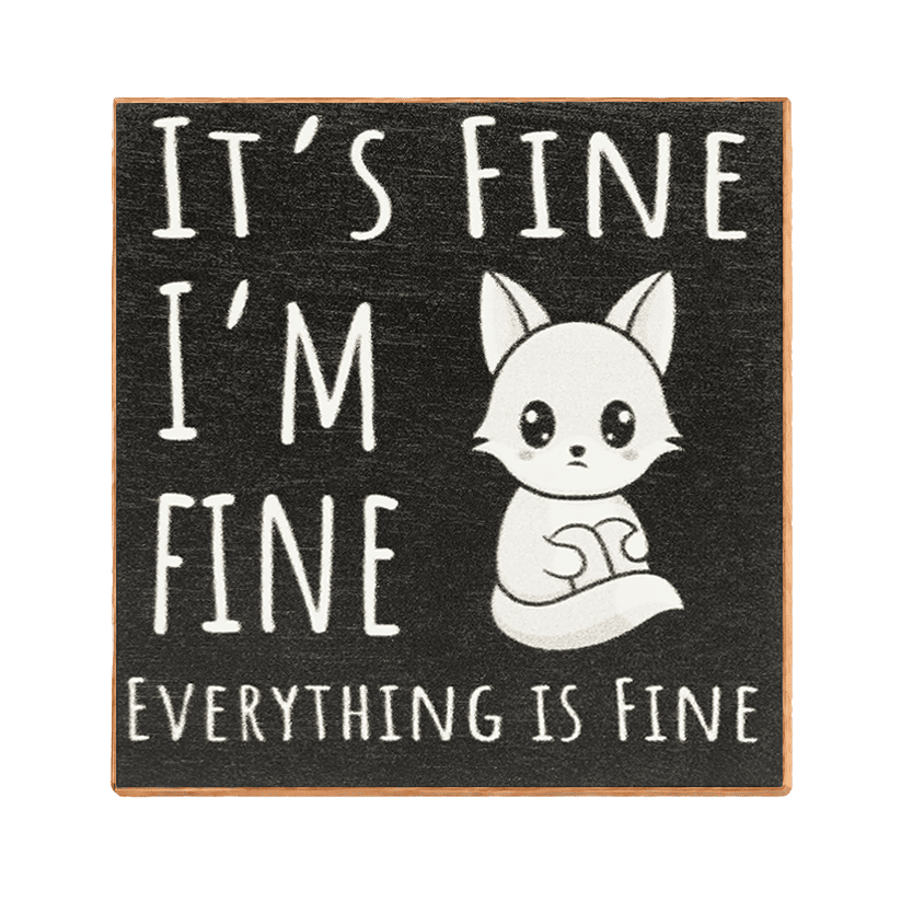 A square decorative sign with a dark charcoal background and white text reading “IT’S FINE I’M FINE EVERYTHING IS FINE,” accompanied by a small white cartoon fox sitting on the right side. The sign has a thin light brown wooden edge and is photographed on a plain white background.