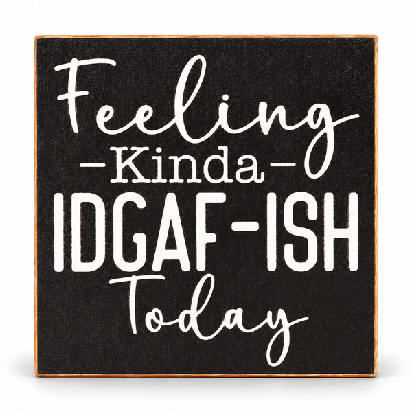 A square decorative sign with a black textured background and a light wood border. White script and block lettering reads, 'Feeling kinda IDGAF-ISH today.