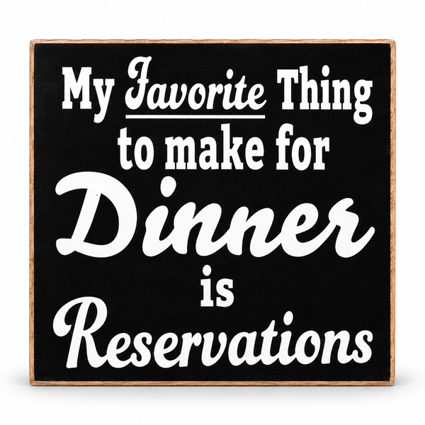 A square decorative sign with a black face, white decorative text reading 'My Favorite Thing to make for Dinner is Reservations,' and a light natural wood border, shown on a plain white background.