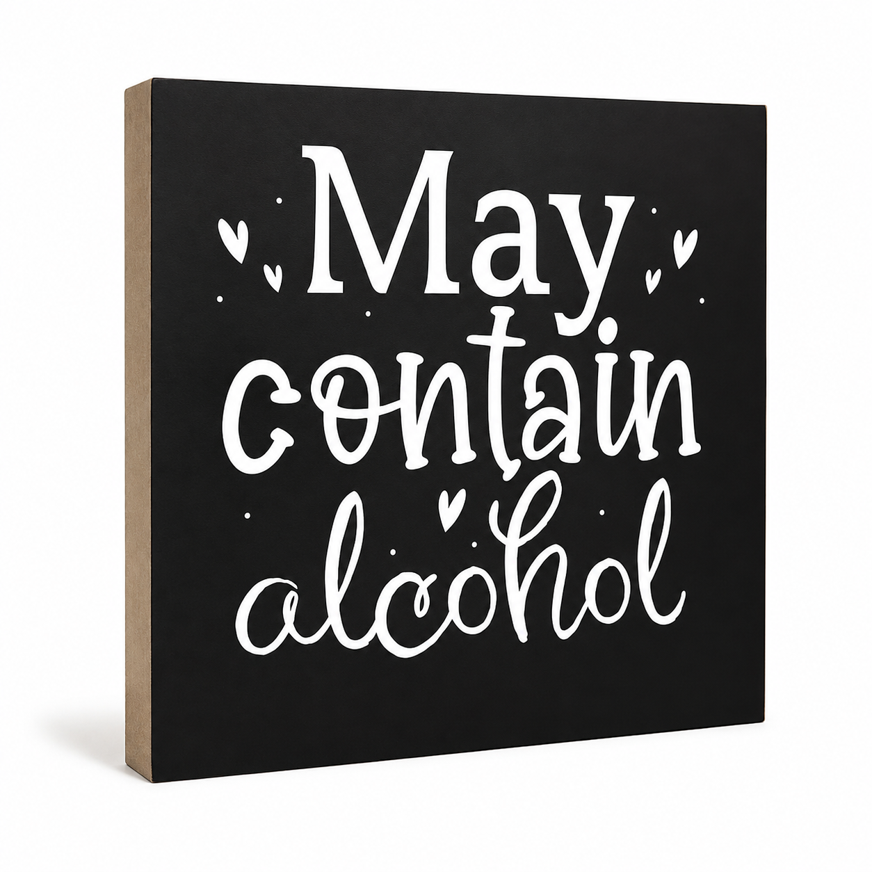 A square black decorative sign with white hand-lettered text reading 'May contain alcohol' and small heart and dot accents, shown at a slight angle on a white background.