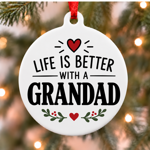 White round Christmas ornament reading Life Is Better With a Grandad with a red heart and green leafy accents