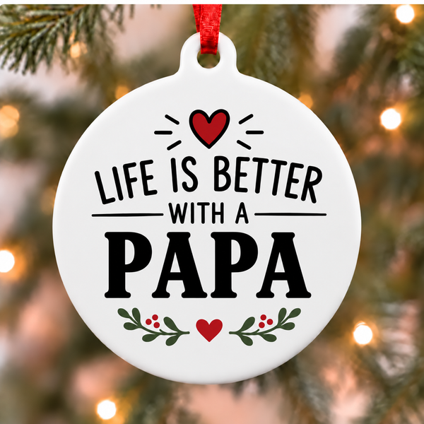 White round Christmas ornament reading Life Is Better With a Papa with a red heart and green leafy accents
