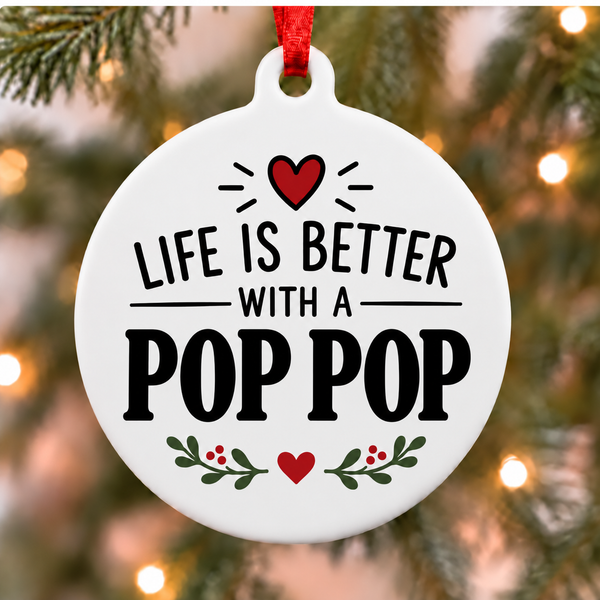 White round Christmas ornament reading Life Is Better With a Pop Pop with a red heart and green leafy accents